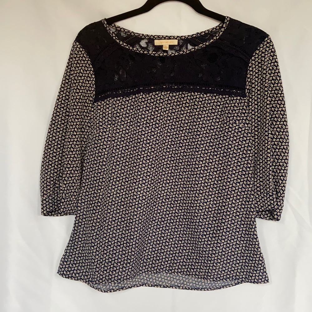 Skies are blue size small navy blue floral and lace top